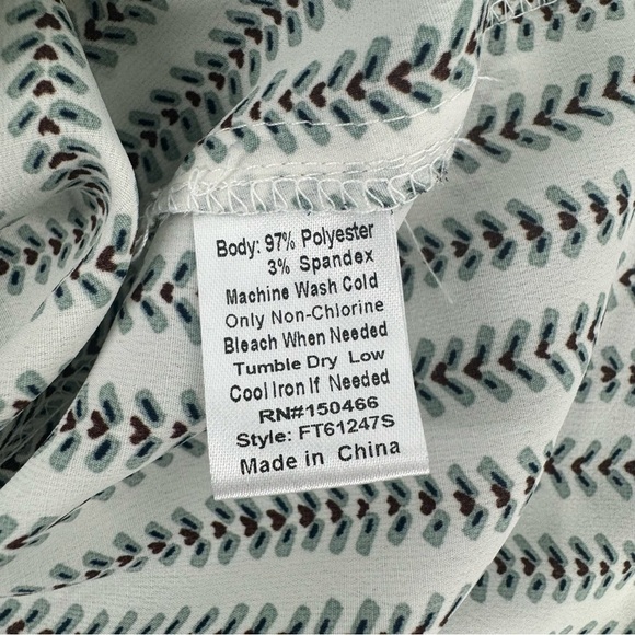 V-Neck Sleeveless Blouse with green and red pattern. - Picture 6 of 7